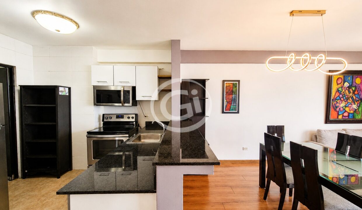 11. Cocina y sala Alquiler Bayfront
