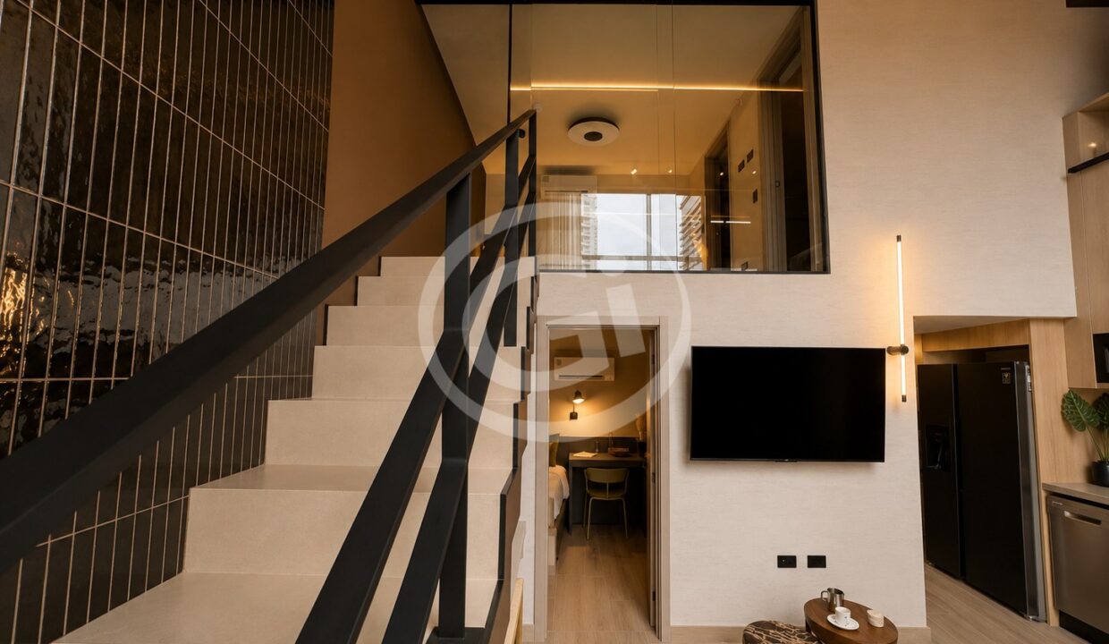 14-32. Escalera Sala venta apartamento Dovle Selva Coco del Mar